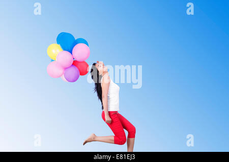 indian Girl Park Fun Balloon Stock Photo