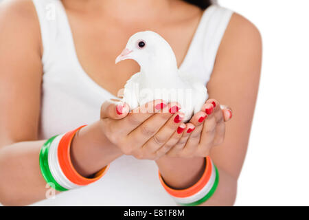 indian Girl Flying Pigeon Stock Photo