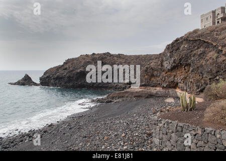 Canary Islands Tenerife rocky beach waves break Stock Photo