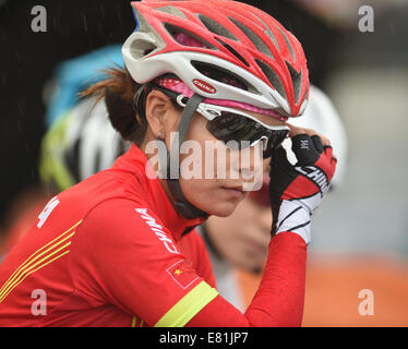 Incheon, South Korea. 29th Sep, 2014. Tang Kerong of China competes during the women's road race contest of cycling at the 17th Asian Games in Incheon, South Korea, Sept. 29, 2014. © Xie Haining/Xinhua/Alamy Live News