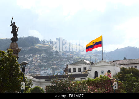Ecuadorian flag flying on the top of Carondelet Palace (Presidential Palace) on Plaza Grande in Quito, Ecuador Stock Photo