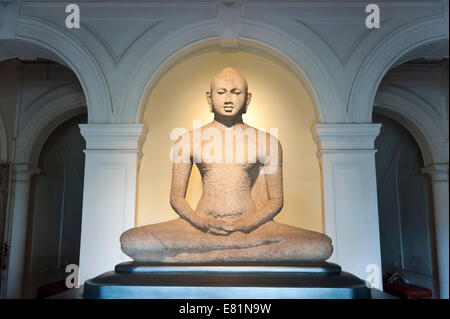 Ancient Buddha figure, posture of meditation, Dhyana Mudra, National Museum, Colombo, Sri Lanka Stock Photo