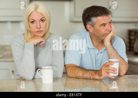 Mature couple having coffee together not talking Stock Photo