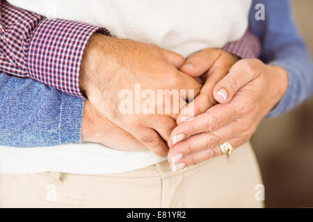 Happy mature couple hugging each other Stock Photo