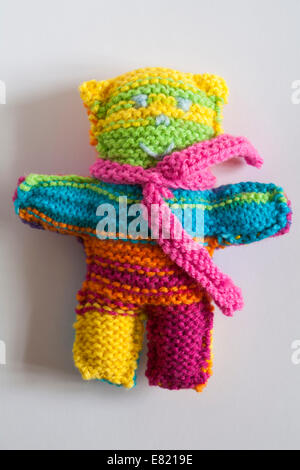 hand knitted teddy bear on white background Stock Photo