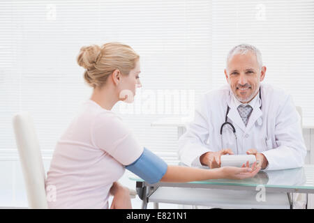 Doctor doing test at his patient Stock Photo
