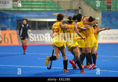 Incheon, South Korea. 29th Sep, 2014. Players of China celebrate after the women's hockey semifinal match against Japan at the 17th Asian Games in Incheon, South Korea, Sept. 29, 2014. China won 1-0. © Zhu Zheng/Xinhua/Alamy Live News