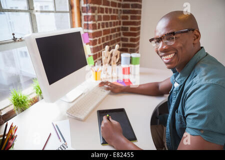 Casual designer using graphics tablet Stock Photo