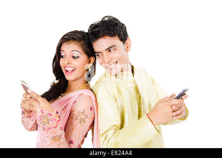 indian Beautiful Couple chatting phone Stock Photo