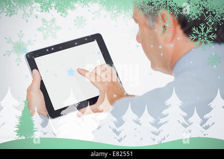 Mature businessman using digital tablet Stock Photo