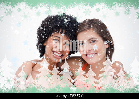 Two smiling friends holding each other by the shoulder Stock Photo