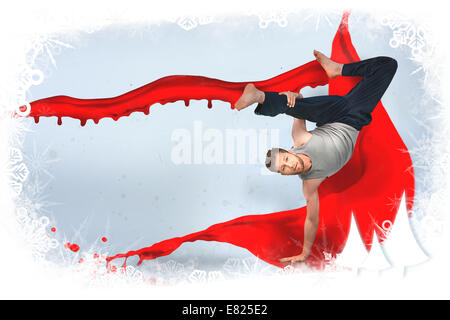 Break dancer doing a handstand Stock Photo