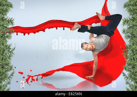 Break dancer doing a handstand Stock Photo