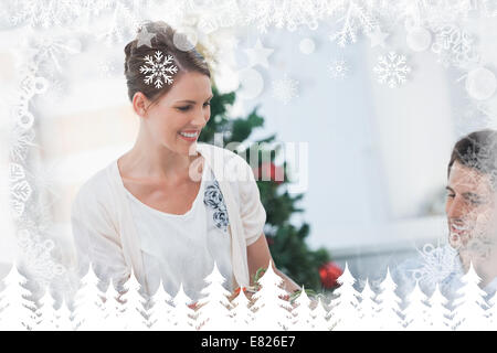 Composite image of attractive woman bringing a roast chicken at table Stock Photo