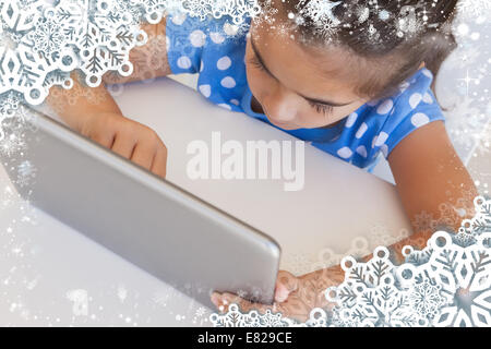 Close up of a girl using digital tablet on table Stock Photo