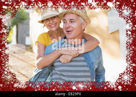 Happy mature couple having fun in the city Stock Photo