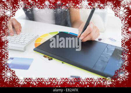 Female photo editor using graphics tablet Stock Photo