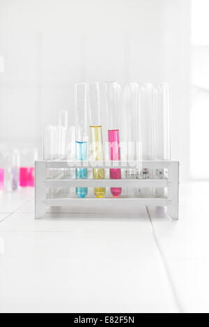 Test tubes in a laboratory with colorful lab samples. Stock Photo