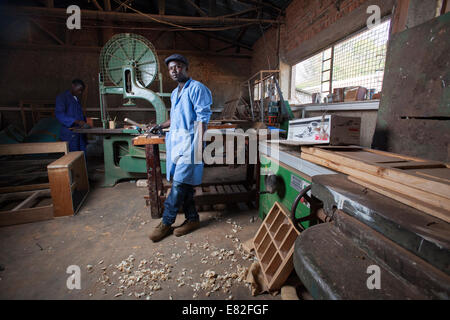 Rwandan carpenter in his workshop, Kigali, Rwanda. Stock Photo