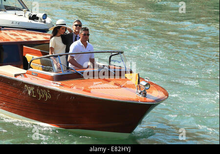 Venice, Italy. 29th Sep, 2014. Actor George Clooney and lawyer Amal Alamuddin arrive for their civil ceremony in Venice. Stock Photo