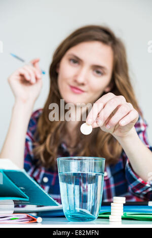 Teenage girl revising exams. Stock Photo