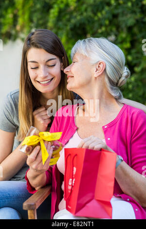 Woman receiving a gift. Stock Photo
