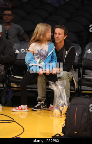 Breckin Meyer and his daughter Caitlin Willow out at the Lakers game. The Los Angeles Lakers defeated the Orlando Magic by the final score of 103-94 at Staples Center  Featuring: Breckin Meyer,Caitlin Willow Meyer Where: Los Angeles, California, United States When: 23 Mar 2014 Stock Photo