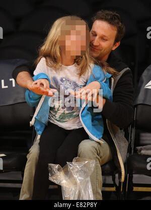 Breckin Meyer and his daughter Caitlin Willow out at the Lakers game. The Los Angeles Lakers defeated the Orlando Magic by the final score of 103-94 at Staples Center  Featuring: Breckin Meyer,Caitlin Willow Meyer Where: Los Angeles, California, United States When: 23 Mar 2014 Stock Photo