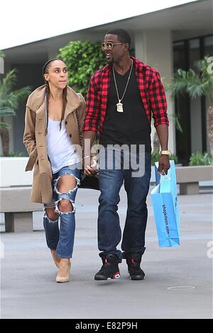 Lance Gross and his Rebecca Jefferson shop at Kitson on Robertson Boulevard  Featuring: Lance Gross,Rebecca Jefferson Where: Los Angeles, California, United States When: 23 Mar 2014 Stock Photo
