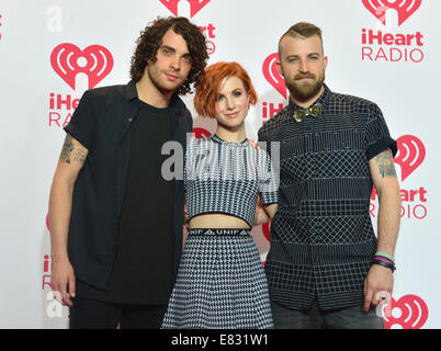 Members of the rock band Paramore attends the 2014 iHeartRadio Music Festival in Las Vegas Stock Photo