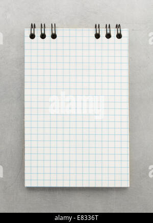 checked notebook at metal background texture Stock Photo