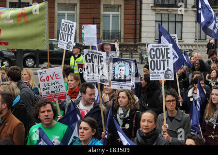 Teachers march in Central London during a national day of strike action. They are protesting against education reforms and working conditions brought about by Michael Gove's policies. They angry at unfair pensions changes and excessive workload/bureaucracy and demand better pay.  Featuring: Demonstrators,Protesters Where: London, United Kingdom When: 26 Mar 2014 Stock Photo
