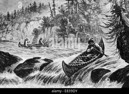 North American Indian skin Canoe shooting river rapids circa 1885 Stock Photo