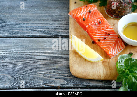 Red fresh fish, salmon on board, food close up Stock Photo