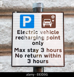 Sign indicating electric vehicle recharging point, Birmingham City, England, UK. Stock Photo