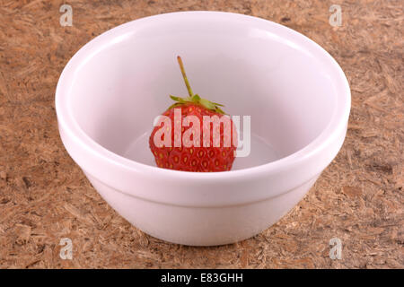 Fresh ripe strawberries on a vintage wooden background Stock Photo