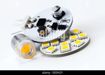 two different types of G4 LED bulbs and electronics side of led lights with 12 SMD chips Stock Photo