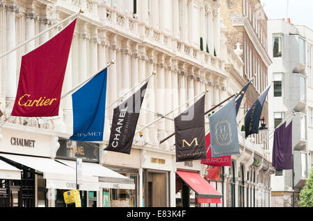 Expensive shop signs in New Bond Street, London, England, UK