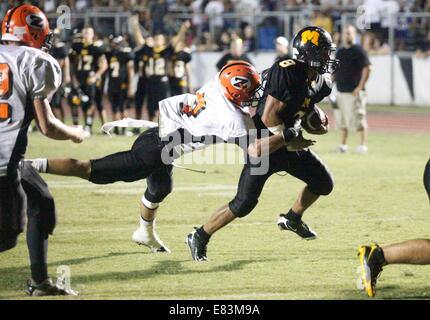 Oct. 09, 2009 - Trinity, FL, USA - PHOTO: CAPTION: [Trinity - 10/09/09)].Ricky Trinidad (8) of Mitchell breaks a tackle to score a touchdown during the second quarter of the Zephyrhills Mitchell game at Michell Friday October 9th 2009. (Credit Image: © St. Petersburg Times/ZUMA Wire) Stock Photo