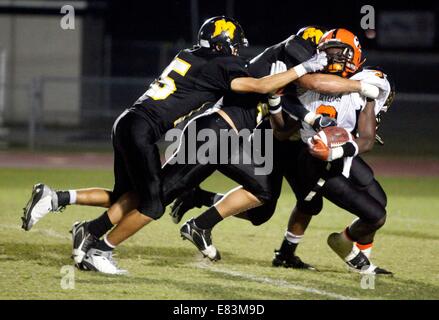 Oct. 09, 2009 - Trinity, FL, USA - PHOTO: CAPTION: [Trinity - 10/09/09)].Chris Reaves (9) of Zephyrhills is gang tackled in the backfield during the first quarter of the Zephyrhills Mitchell game at Michell Friday October 9th 2009. (Credit Image: © St. Petersburg Times/ZUMA Wire) Stock Photo