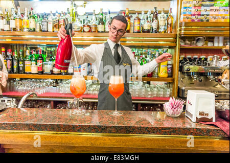 Barman making cocktails in a bar in Sassari, Sardinia, Italy Stock Photo
