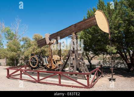 California, Kern County, Taft, West Kern Oil Museum, wooden walking beam oil pump jack Stock Photo