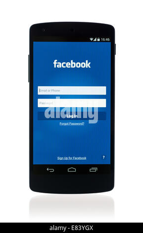 Studio shot of brand new Google Nexus 5, powered by Android 4.4 version, with Facebook mobile application on a screen. Stock Photo