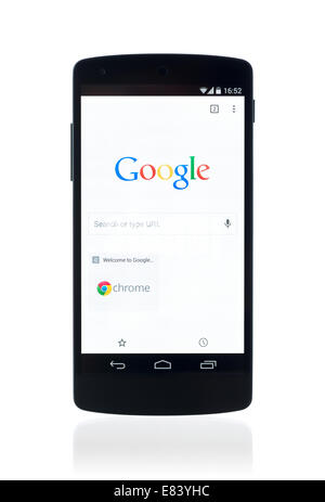 Studio shot of brand new Google Nexus 5 with Google search webpage in Chrome browser on a screen. Stock Photo