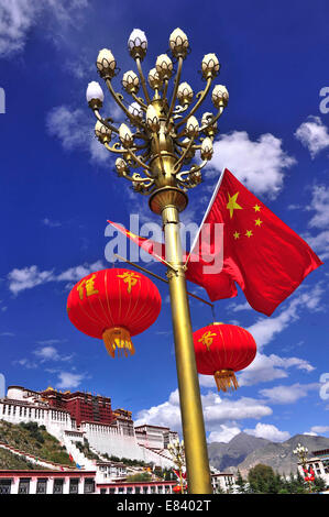 National flags of China are hung in the street light, welcoming the ...