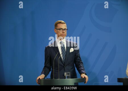 Berlin, Germany. 29th Sept, 2014. The Prime Minister of Finland Alexander Stubb during the Press Conference Federal Chancellery. Credit:  Simone Kuhlmey/Pacific Press/Alamy Live News Stock Photo