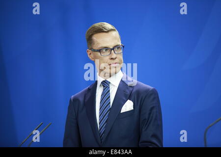 Berlin, Germany. 29th Sept, 2014. The Prime Minister of Finland Alexander Stubb during the Press Conference Federal Chancellery. Credit:  Simone Kuhlmey/Pacific Press/Alamy Live News Stock Photo