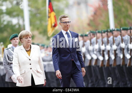 Berlin, Germany. 29th Sept, 2014.Chancellor Angela Merkel welcomes the Prime Minister of Finland Alexander Stubb during his visit at the Chancellery. Credit:  Simone Kuhlmey/Pacific Press/Alamy Live News Stock Photo