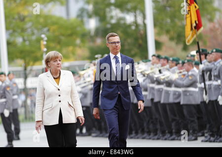 Berlin, Germany. 29th Sept, 2014.Chancellor Angela Merkel welcomes the Prime Minister of Finland Alexander Stubb during his visit at the Chancellery. Credit:  Simone Kuhlmey/Pacific Press/Alamy Live News Stock Photo