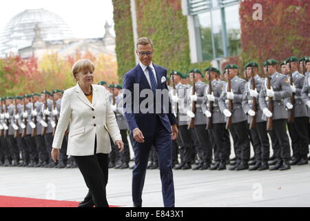 Berlin, Germany. 29th Sept, 2014.Chancellor Angela Merkel welcomes the Prime Minister of Finland Alexander Stubb during his visit at the Chancellery. Credit:  Simone Kuhlmey/Pacific Press/Alamy Live News Stock Photo